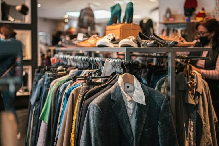 Curated thrift store clothing rack with diverse styles ready for marketplace listing