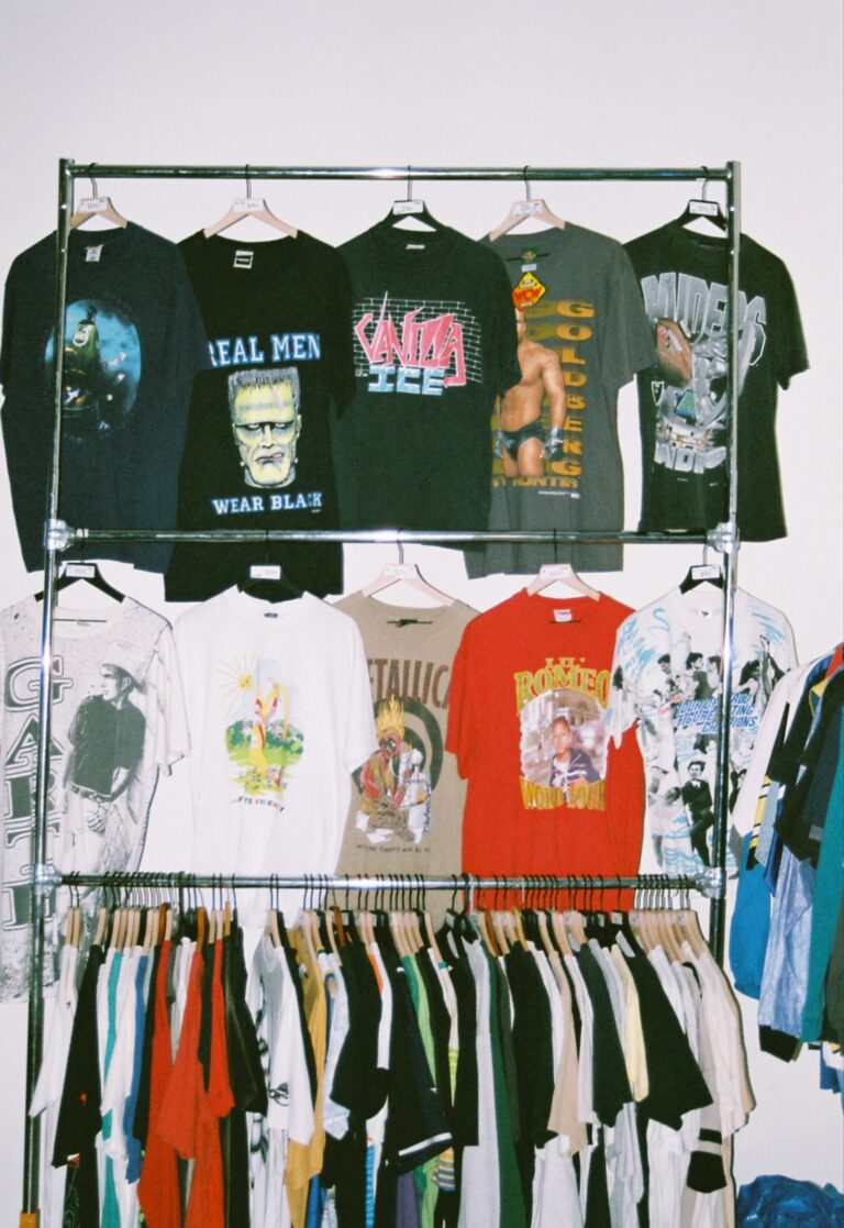 Rack of vintage graphic t-shirts from different eras