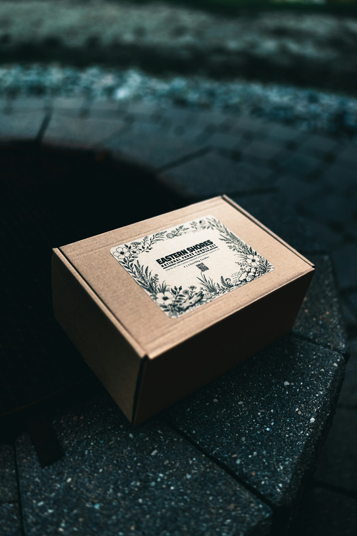 Hand holding a kraft paper package ready to ship