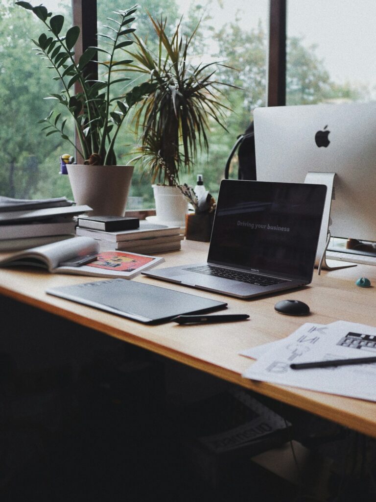 Home office desk with a laptop for running a reselling business