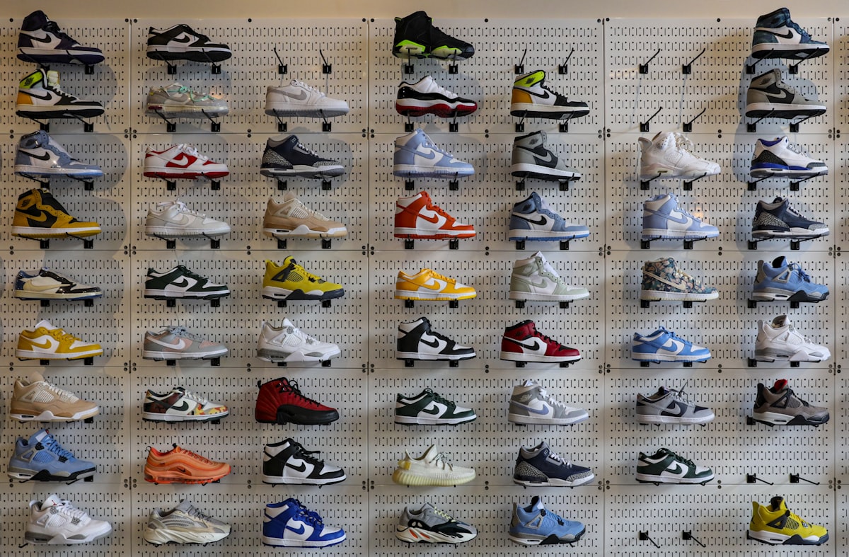 Wall display of sneakers organized for resale