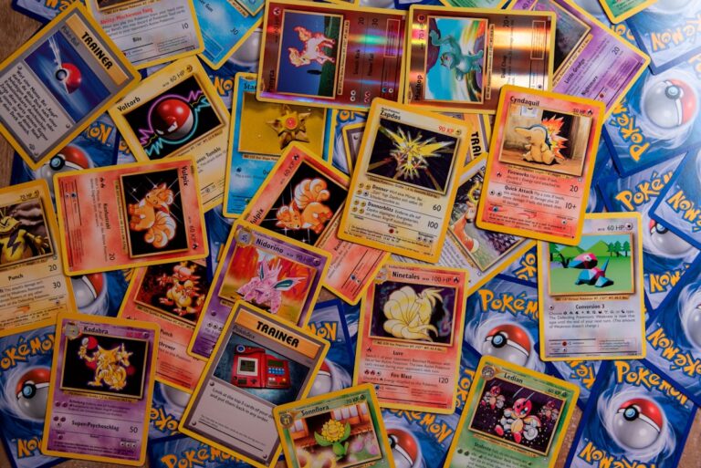 Collection of trading cards spread out for listing