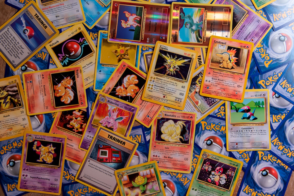 Collection of trading cards spread out for listing